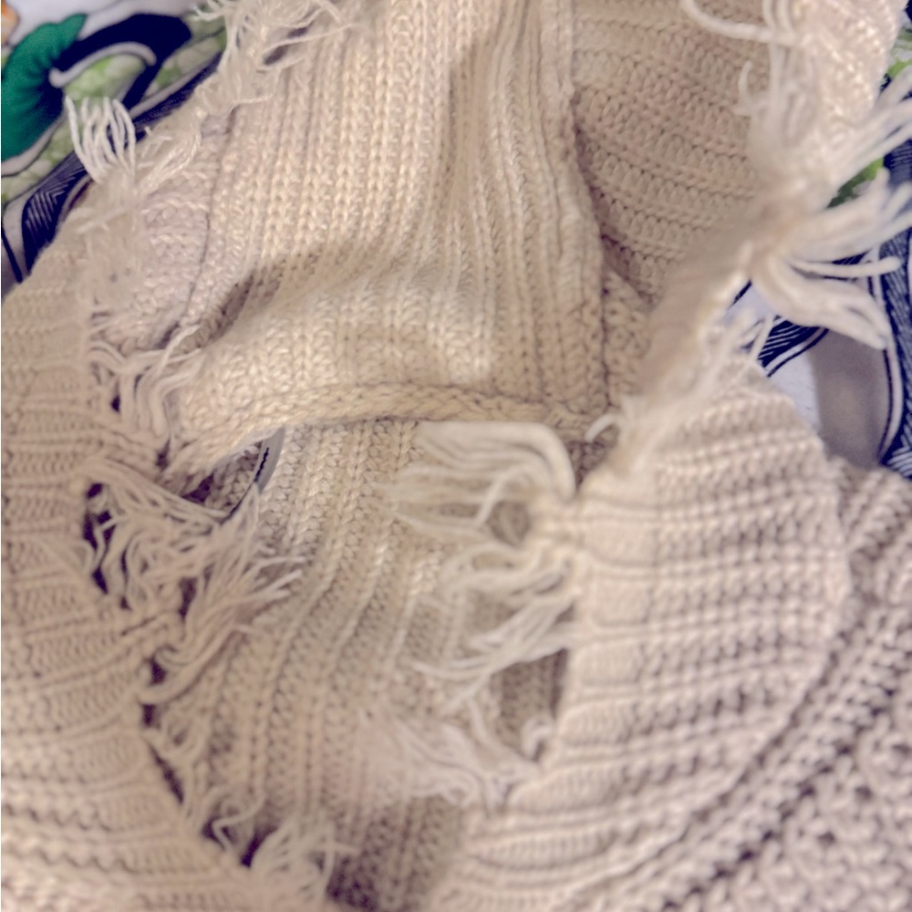Knit type of sweater